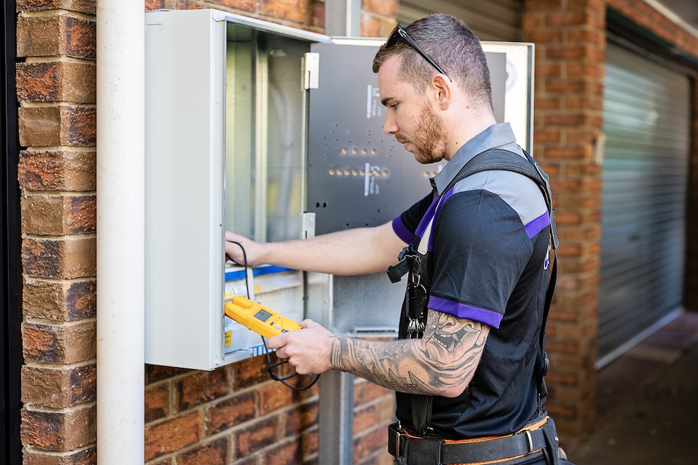 electrician in kingston upgrading a residential switchboard