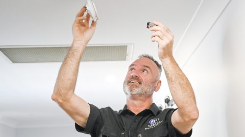 Downlight installation Loganholme, evenly spaced LED downlights installed in an open plan living area with zoned switching and soft, comfortable light.