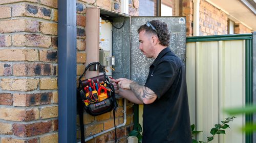 electrician-making-home-more-energy-efficient